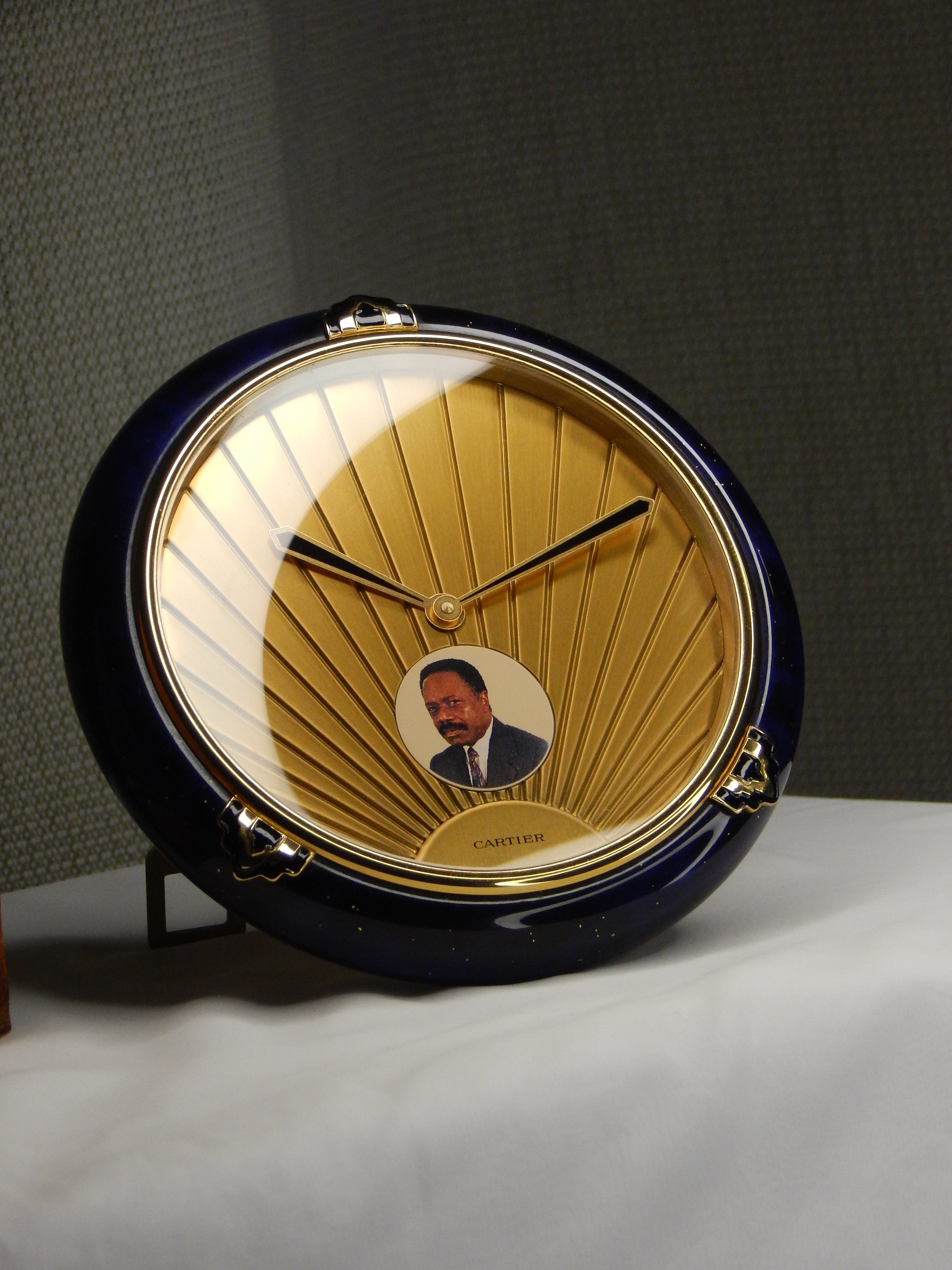 Cartier Lapis Lazuli table clock with a portrait of Omar Bongo