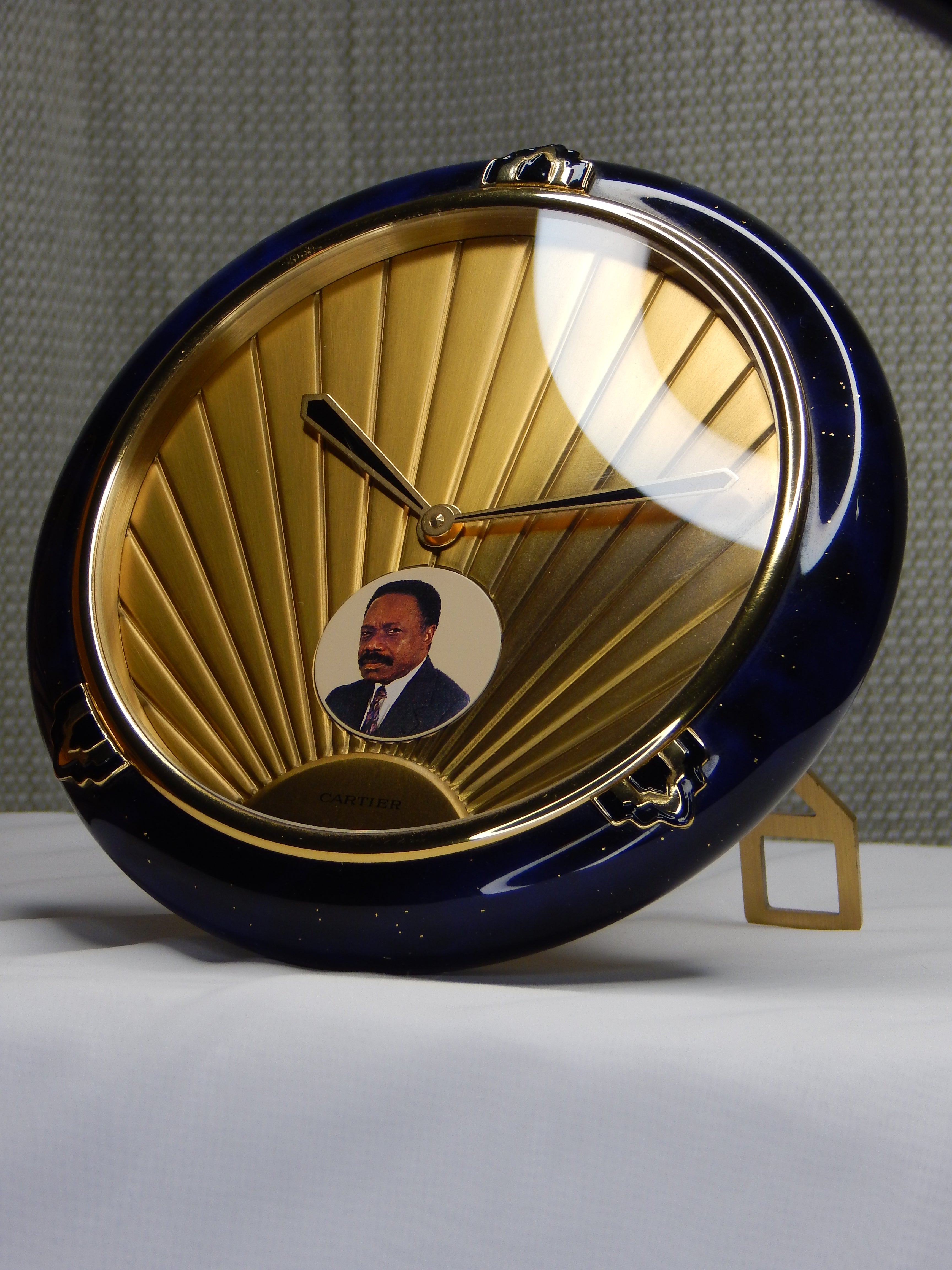 Cartier Lapis Lazuli table clock with a portrait of Omar Bongo